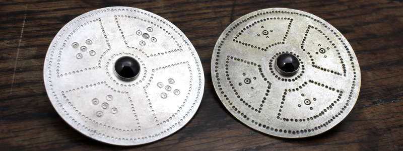 Pair of large saxon disc brooches
